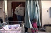 Brennan_Beth_n_becky_play_in_curtain_at_hospital2.jpg (229452 bytes)