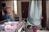 Brennan_Beth_n_becky_play_in_curtain_at_hospital3.jpg (233178 bytes)