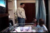 Brennan_Beth_n_becky_play_in_curtain_at_hospital.jpg (241530 bytes)