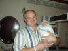 Proud_Daddy_holds_Alex_for_first_time.jpg (278609 bytes)
