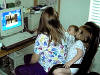 All_three_girls_in Daddys_chair.jpg (423044 bytes)