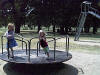 Beth_n_Becky_on_2merry_go_round.jpg (328956 bytes)