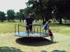 Daddy_and_girls_at_playground.jpg (329833 bytes)